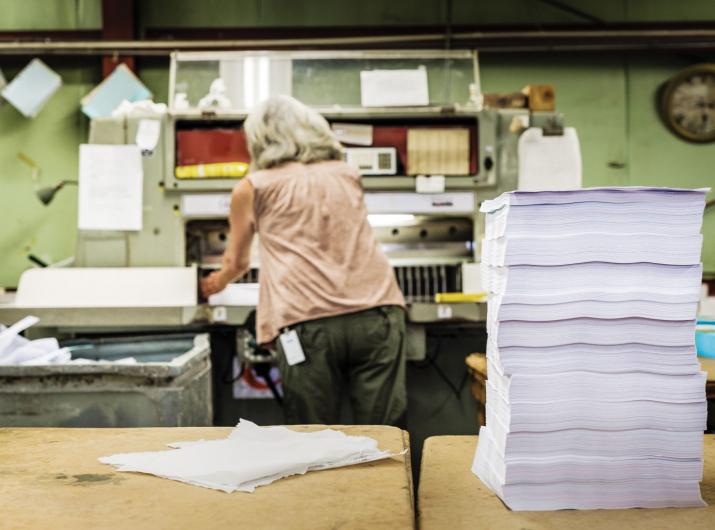 Prepress/production supervisor Starlett Lovel works in this 2018 photo in the printing room at the Municode facility in Tallahas